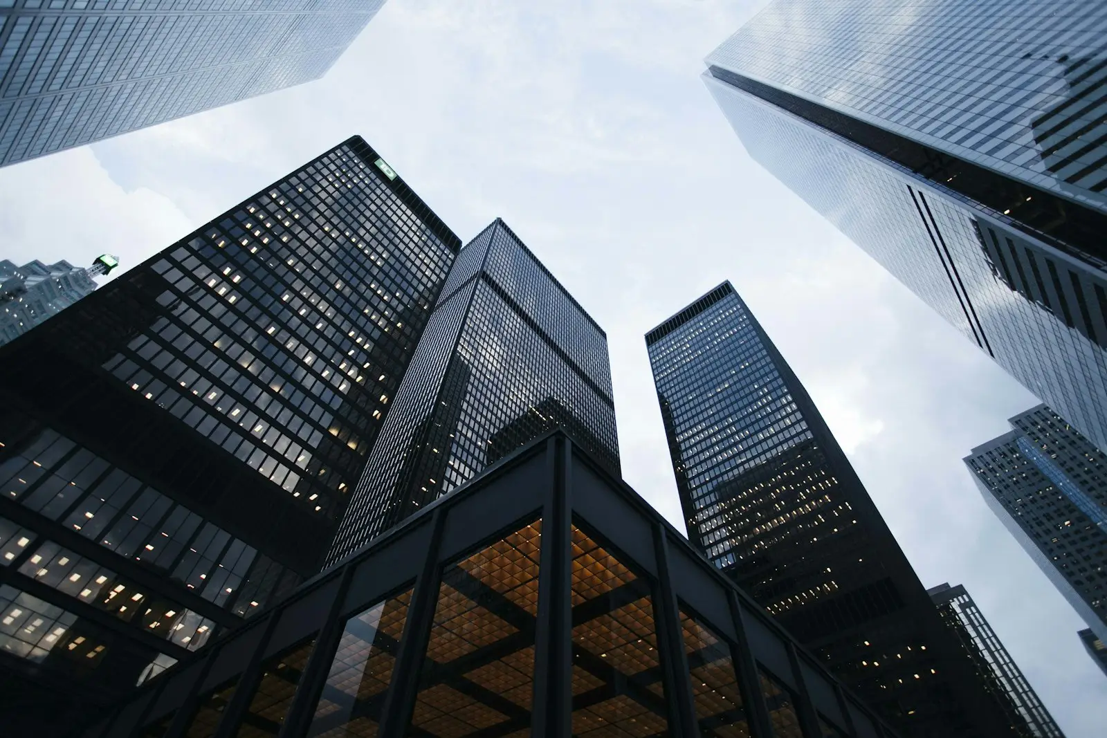 Financial-district skyscrapers — the institutions of capital that own the value-creation problem